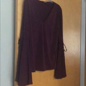 Express top with bell sleeves